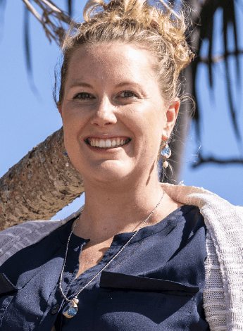 The image is of researcher Sasha Job. She has curly blonde hair. 